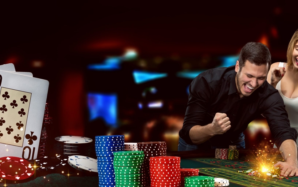 young-excited-man-woman-are-happy-about-their-win-they-are-posing-while-standing-playing-table-against-colorful-background-winning-combination-poker-stacks-chips-gambling-casino